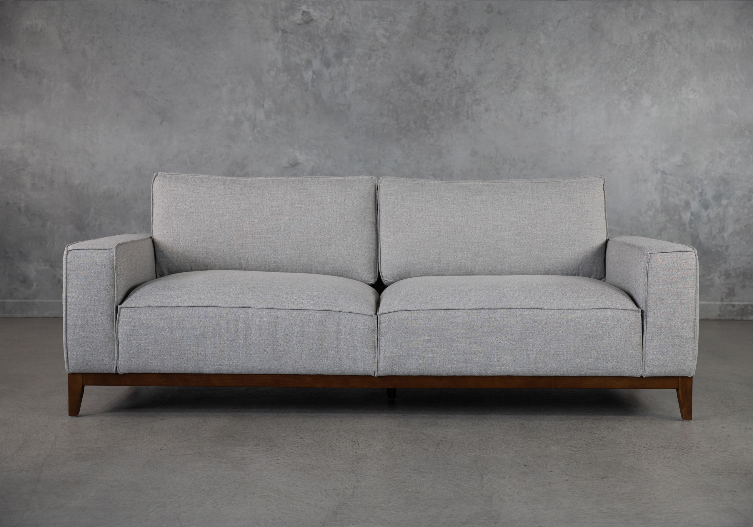 Kriston Wood Base Grey Fabric Sofa | Muse & Merchant